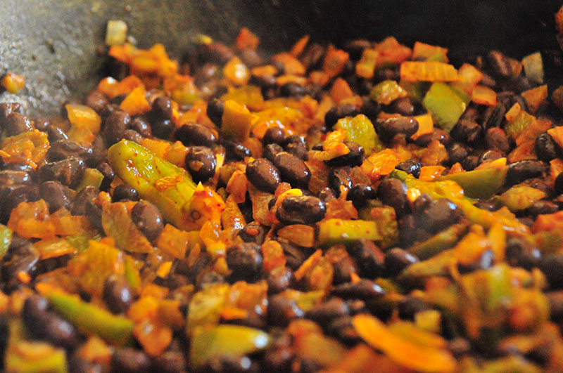 jerky-nachos-cooking-beans