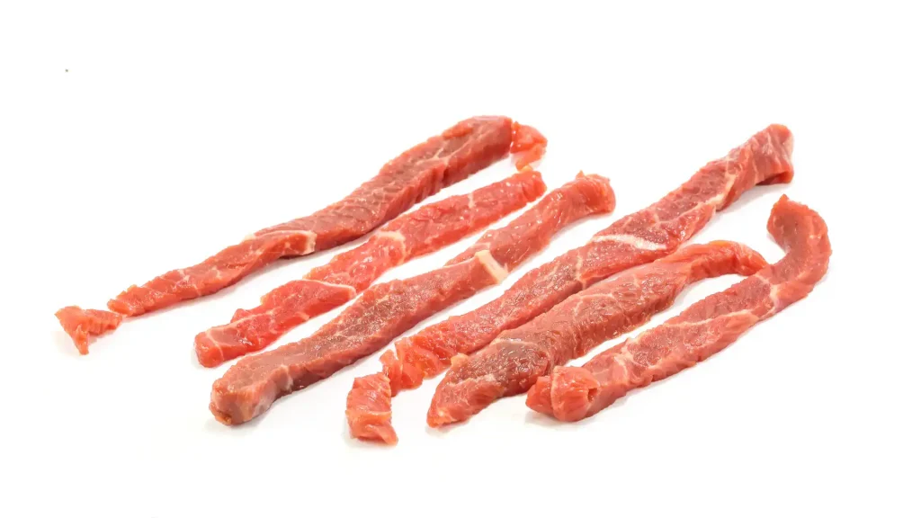 raw beef cut into strips for air fryer beef jerky