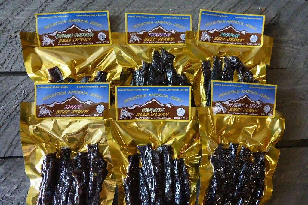 Six bags of popular beef jerky flavors in vacuum-sealed bags